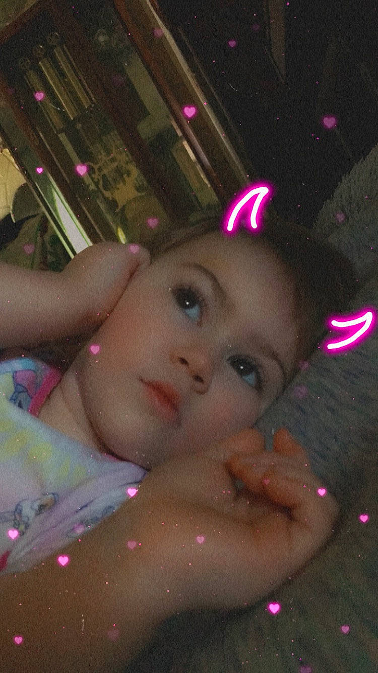 Brylah is registered to the contest to win money with this photo: beauty, black_hair, cheek, chest, child, christmas_ornament, event, eyebrow, eyelash, finger, fun, happy, human_body, lip, magenta, mouth, person, pink, skin, toddler