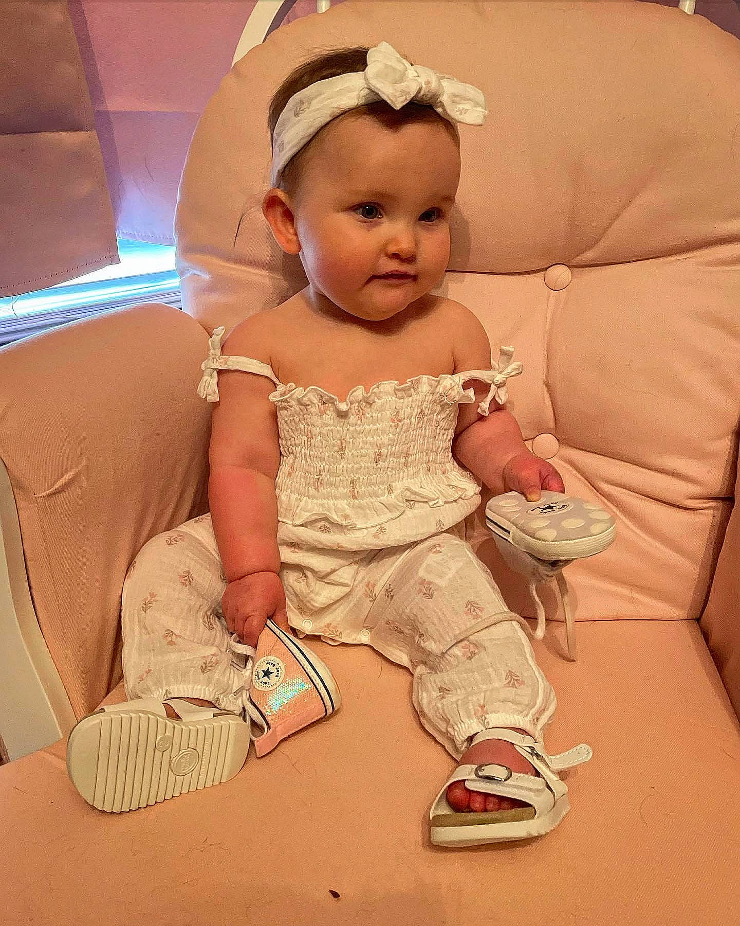 Callie joined the competition — help win amazing prizes! baby, baby_products, baby_toddler_clothing, blond, child, comfort, couch, fashion_accessory, finger, foot, fun, happy, headgear, human_leg, lap, person, shoe, sitting, thigh, thumb
