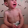 Coby joined the competition — help win amazing prizes! toddler, child, diaper, laughing, messy_face, sitting, indoor, happy, skin, couch, wall, floral_pattern, bare_chest, young_child, person, cute, playful, expression, infant, smile