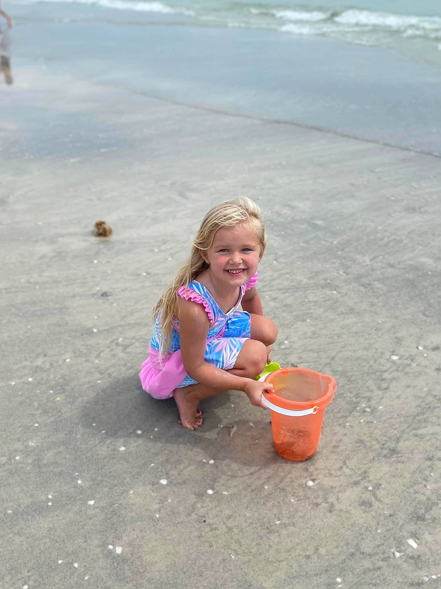 Breckyn joined the competition — help win amazing prizes! asphalt, beach, body_of_water, bucket, child, coast, fun, happy, joy, leisure, ocean, people_in_nature, people_on_beach, person, recreation, sand, smile, soil, toddler, travel