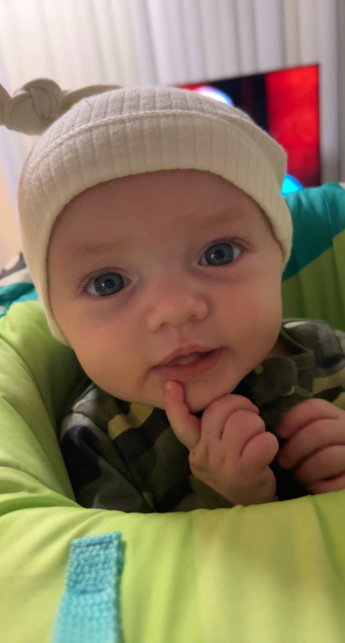 Daxton is registered to the contest to win money with this photo: baby, cap, cheek, chin, cool, eye, eyebrow, face, facial_expression, finger, gesture, happy, headwear, iris, lip, mouth, nose, person, product, skin
