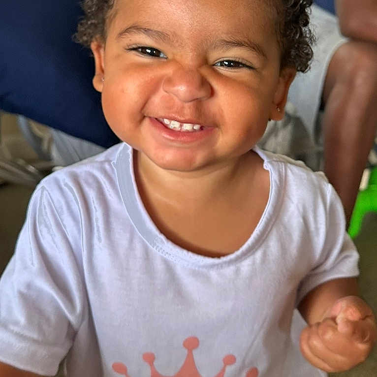 Ellyanah is registered to the contest to win money with this photo: baby, babylaughing, bodypart, child, clothing, face, female, finger, girl, hair, hand, happy, head, mouth, person, photography, portrait, smile, t_shirt, teeth