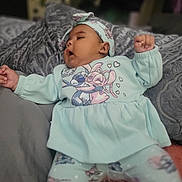 Sariyah is registered to the contest to win money with this photo: baby, bed, bodypart, bonnet, cap, clothing, couch, cushion, face, finger, furniture, hand, hat, head, homedecor, newborn, person, photography, portrait, yawning