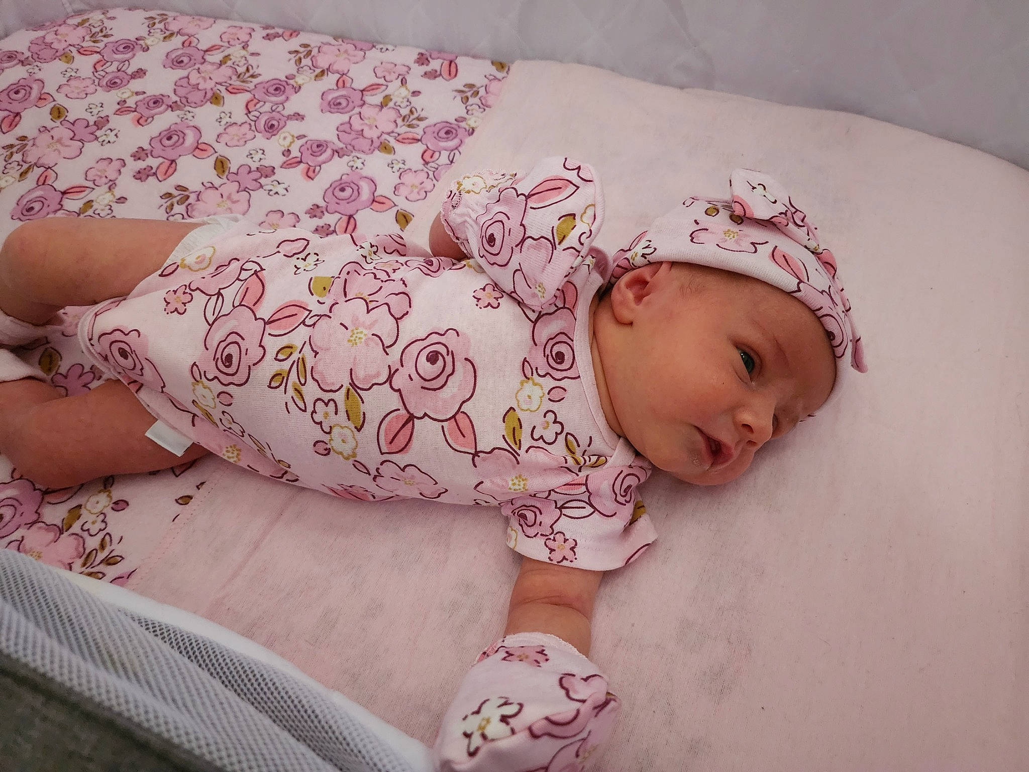 Ellianna is registered to the contest to win money with this photo: arm, baby, baby_sleeping, baby_toddler_clothing, cheek, comfort, eye, face, head, headgear, headwear, human_body, linens, lip, pattern, person, pink, product, skin, sleeve