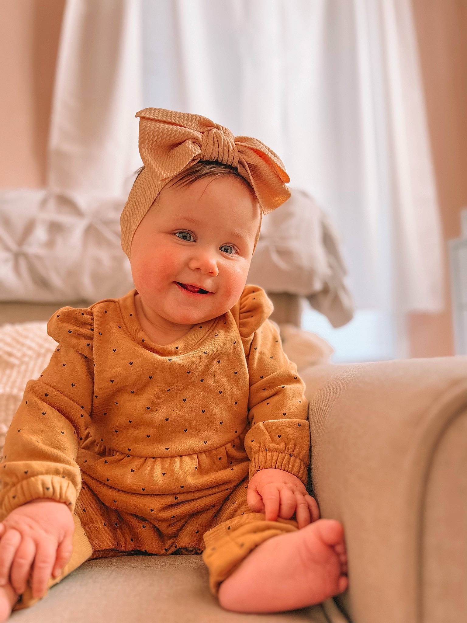 Oakley Rae joined the competition — help win amazing prizes! baby, baby_laughing, baby_toddler_clothing, cheek, child, comfort, eye, finger, flooring, fun, happy, head, headgear, headwear, human_body, joy, peach, person, sitting, skin