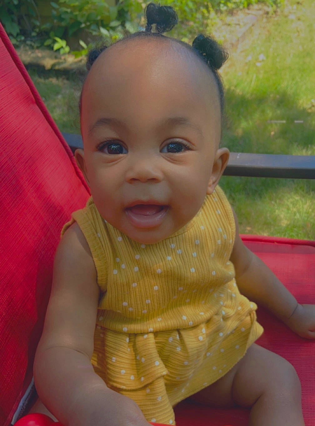 Laileana is registered to the contest to win money with this photo: baby, baby_toddler_clothing, cheek, eye, finger, gesture, grass, happy, head, human_body, iris, leaf, lip, mouth, nose, people_in_nature, person, pink, plant, skin