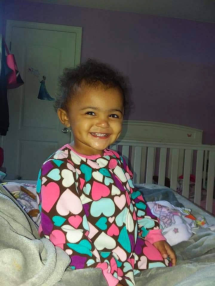 Janelle is registered to the contest to win money with this photo: child, cool, day, eye, fun, girl, head, infant, joy, person, pink, play, product, skin, smile, textile, toddler