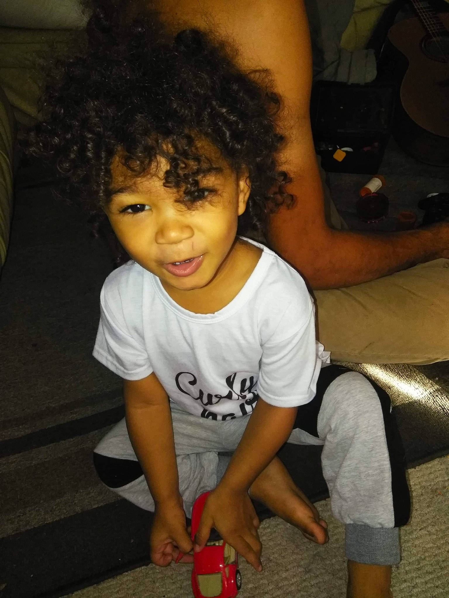 Zayne is registered to the contest to win money with this photo: afro, black_hair, child, fun, hair, hairstyle, person, smile, toddler