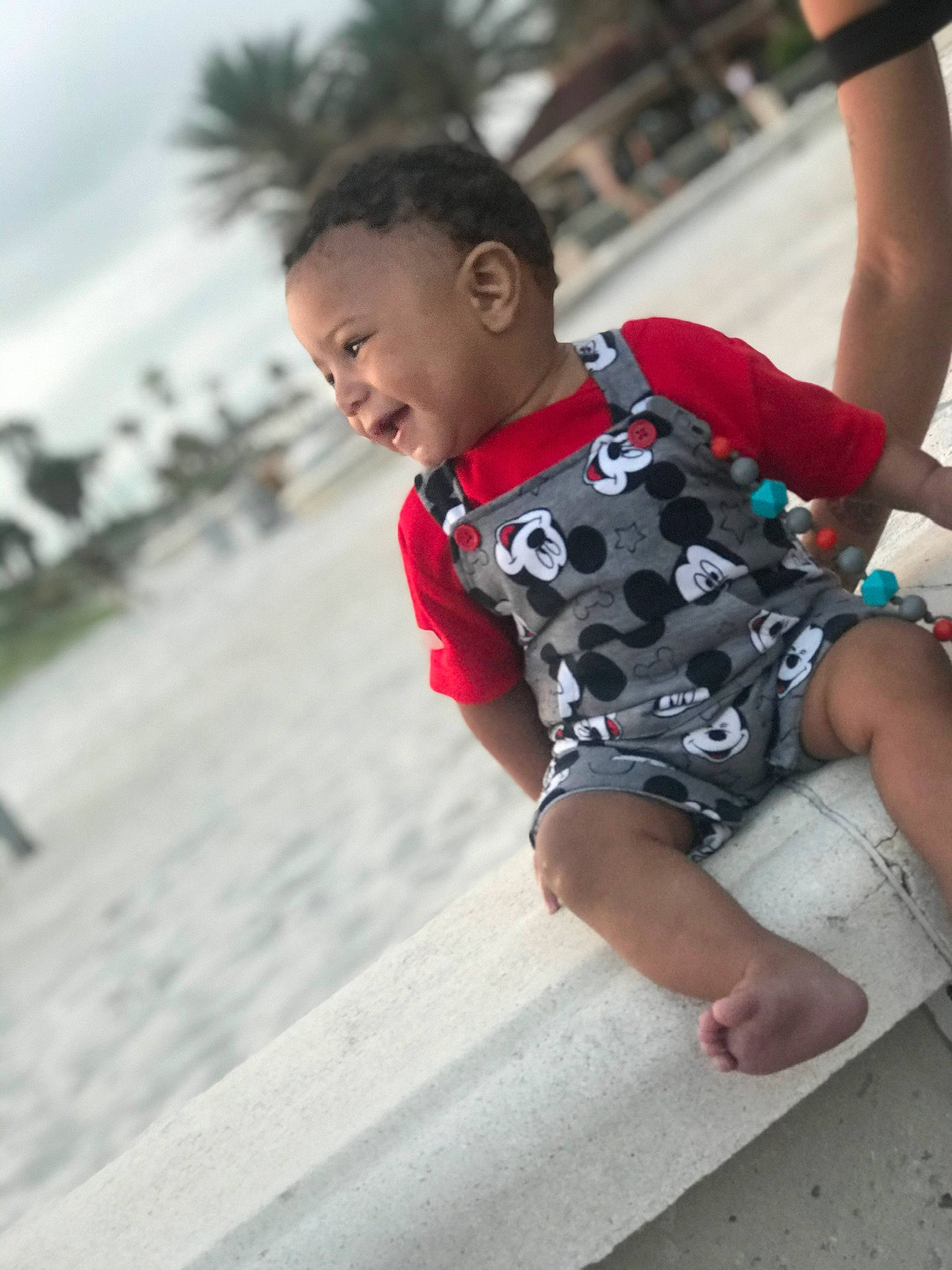 Lumine is registered to the contest to win money with this photo: arm, baby, child, cool, joint, leg, person, photography, play, shoe, sitting, toddler, vacation