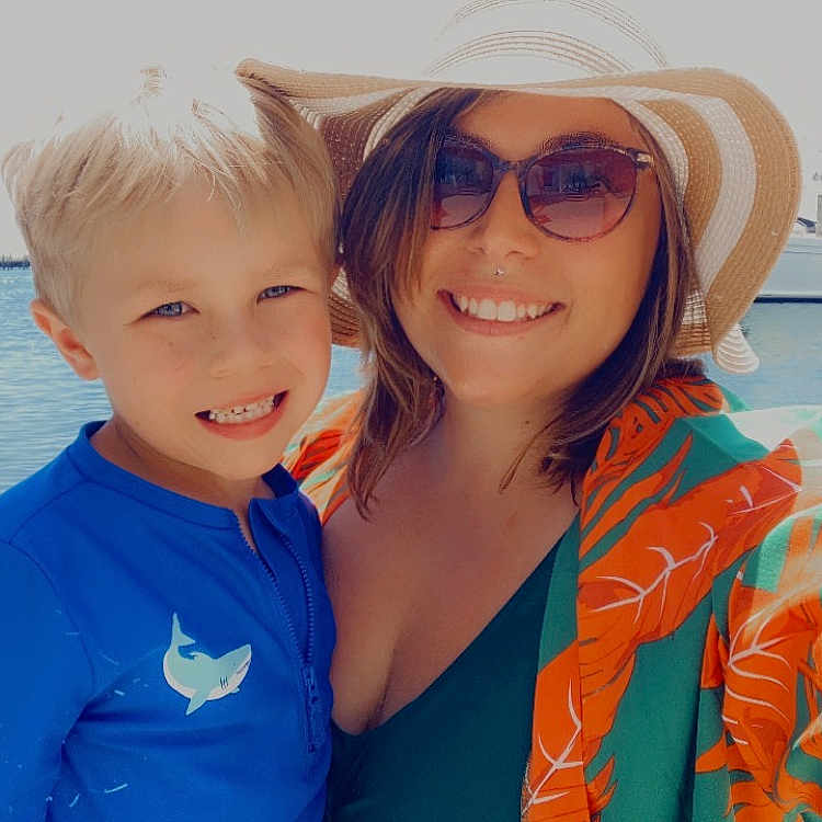 Kyson joined the competition — help win amazing prizes! accessories, adult, boy, child, clothing, face, female, hat, head, male, person, photography, portrait, sunglasses, transportation, vehicle, water, waterfront, woman, yacht
