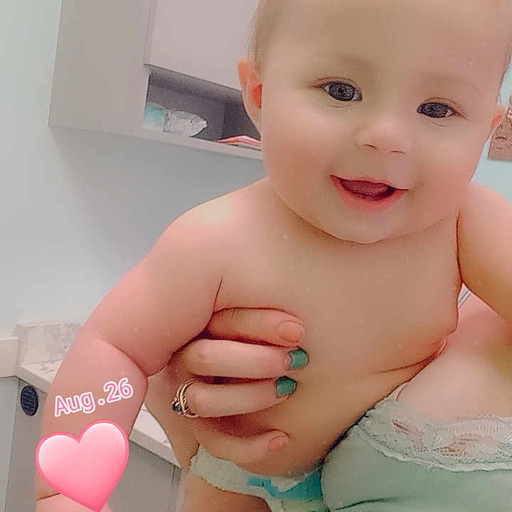 Miley joined the competition — help win amazing prizes! arm, baby, bodypart, clothing, couch, dress, eveningdress, face, finger, furniture, hand, head, lingerie, nail, newborn, person, photography, portrait, underwear, wrist