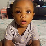 Treasure joined the competition — help win amazing prizes! baby, infant, child, sitting, bed, indoors, curious, expression, clothing, onesie, hands, feet, toes, box, product, closeup, portrait, skin, hair, room