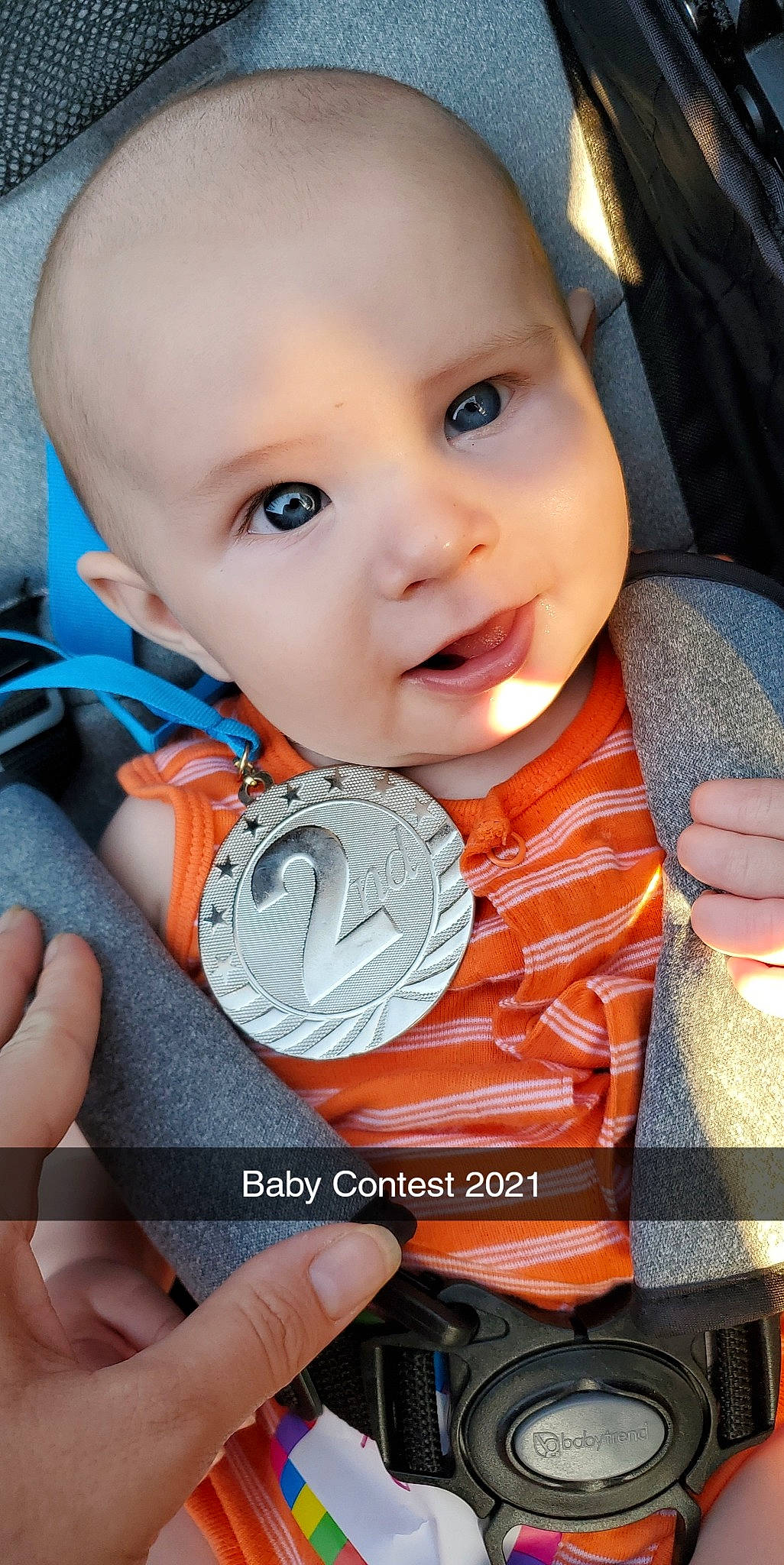 Bo is registered to the contest to win money with this photo: baby, baby_safety, baby_toddler_clothing, cheek, child, eyebrow, eyelash, finger, gesture, hand, happy, iris, mouth, nail, nose, person, photograph, skin, smile, thumb