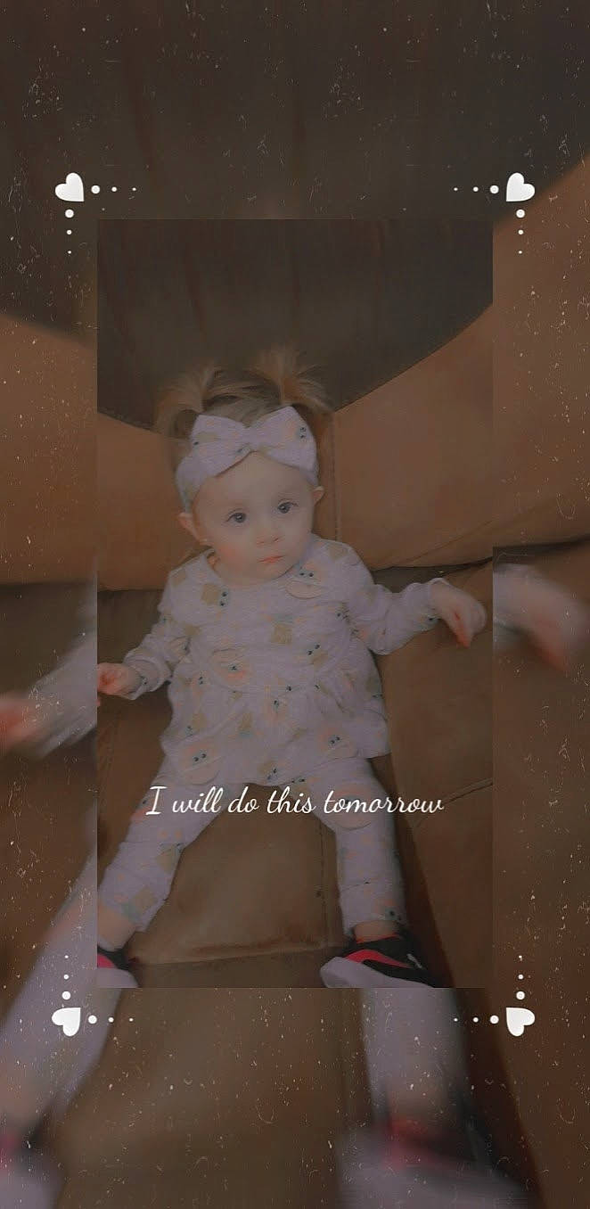 Nancy is registered to the contest to win money with this photo: baby, baby_toddler_clothing, cheek, child, costume, fashion_design, flooring, fun, happy, one_piece_garment, pattern, person, pink, plaster, room, sitting, sleeve, toddler, toy, vintage_clothing