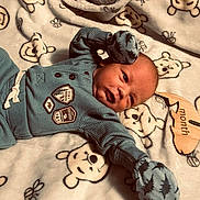 Gavin joined the competition — help win amazing prizes! baby, newborn, infant, blue_clothing, mittens, blanket, bear_pattern, wooden_sign, one_month, lying_down, cute, cozy, soft_texture, milestone, portrait, child, face, sleepwear, baby_clothes, indoors