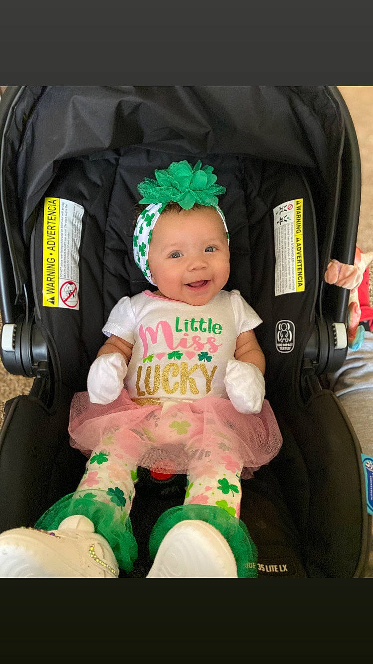 Malani joined the competition — help win amazing prizes! baby, baby_carriage, baby_products, baby_safety, baby_toddler_clothing, bag, car_seat, chair, child, comfort, fashion_accessory, fun, happy, joy, lap, luggage_and_bags, person, personal_protective_equipment, product, sitting