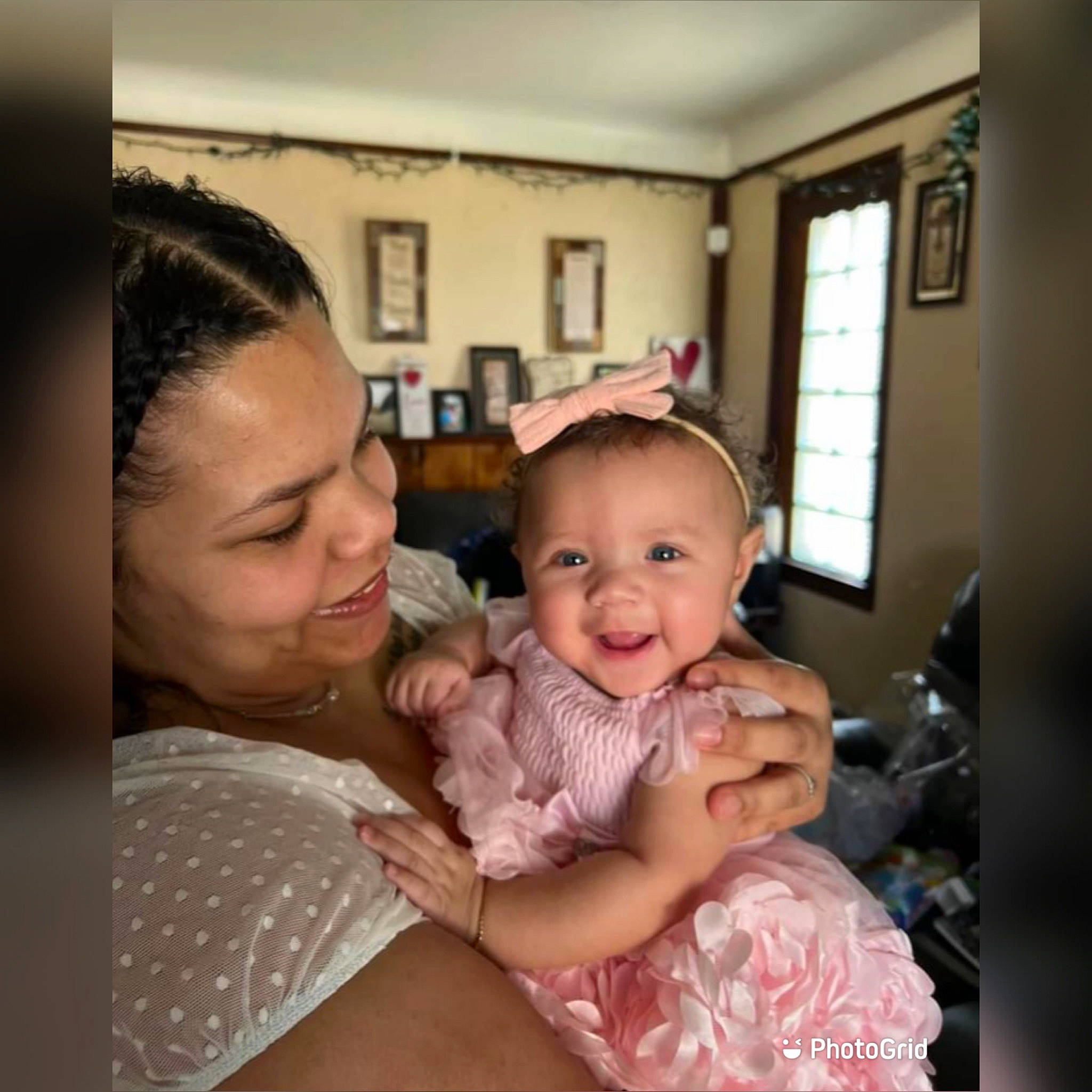 Malani is registered to the contest to win money with this photo: baby, cheek, child, chin, comfort, couch, ear, electronic_device, event, eyebrow, fun, gesture, happy, joy, person, picture_frame, room, sitting, skin, smile