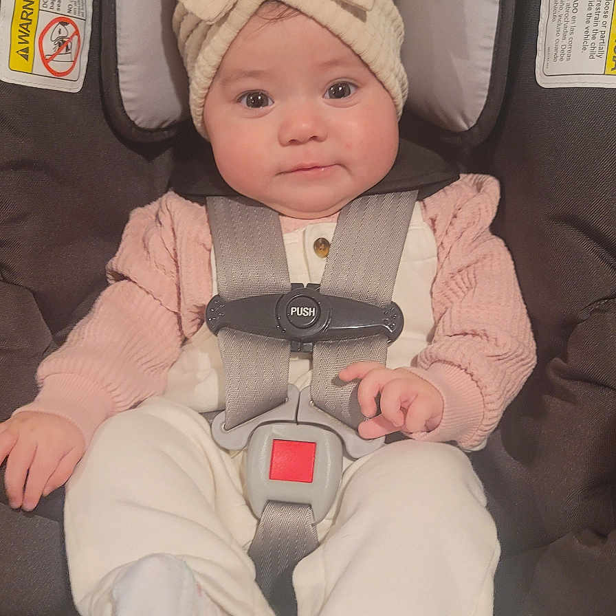 Amaya joined the competition — help win amazing prizes! accessories, baby, bonnet, cap, car, car_interior, carseat, clothing, cushion, face, hat, head, homedecor, hosiery, person, photography, portrait, sock, transportation, vehicle