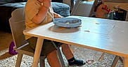 Kasen joined the competition — help win amazing prizes! baby, carpet, child, couch, eating, finger_food, high_chair, indoor, living_room, plate, playset, rocking_horse, sitting, snack, socks, sunlight, table, toddler, toys, window