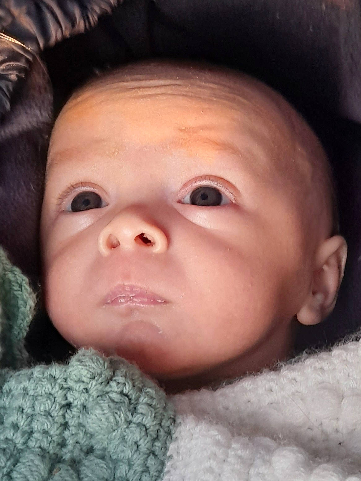 Gabriel participe au concours pour gagner de l'argent avec cette photo : baby, black_hair, cheek, chin, comfort, eye, eyebrow, eyelash, face, facial_expression, flash_photography, forehead, headgear, iris, jaw, lip, mouth, nose, person, skin