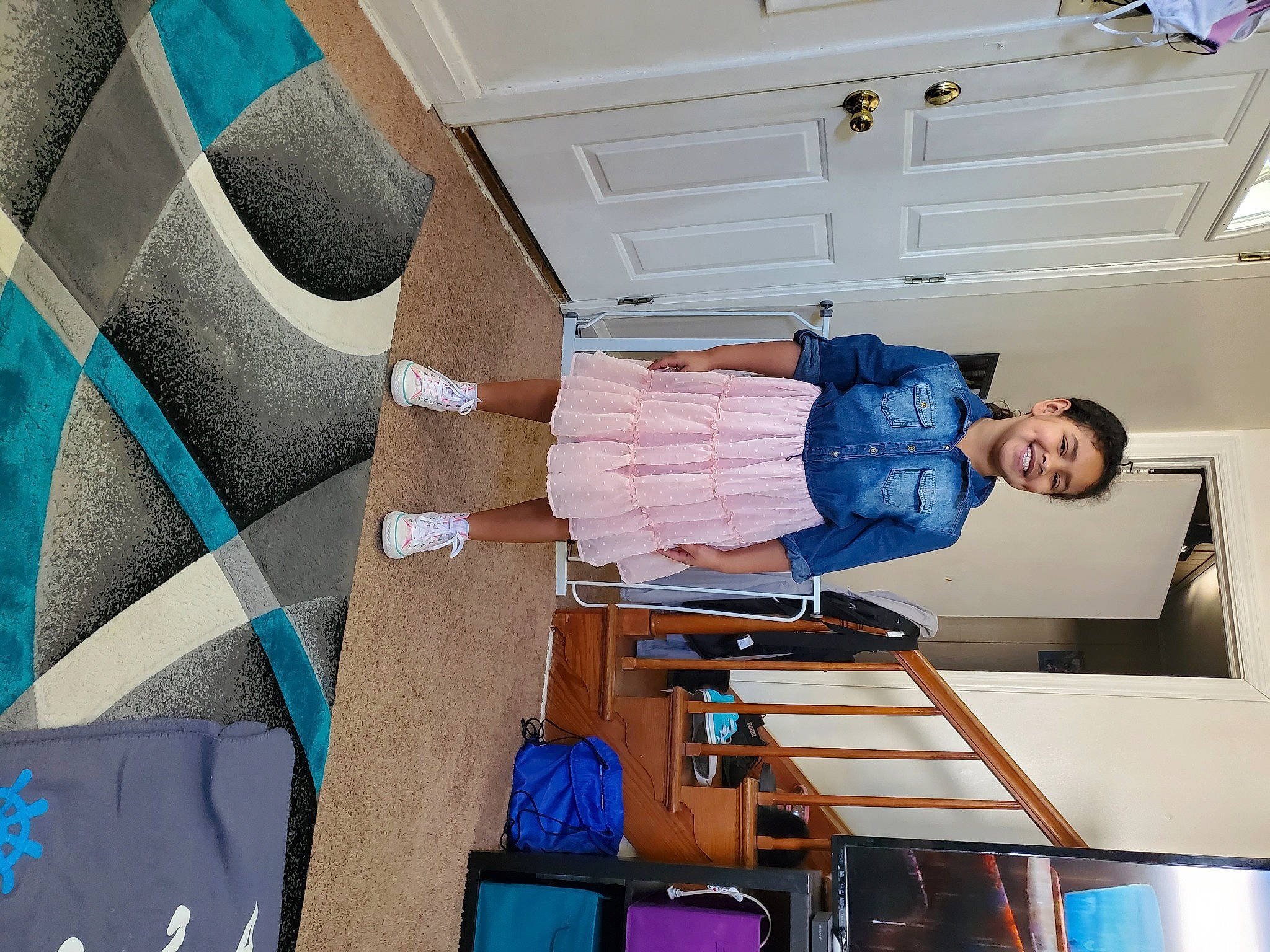 Aaliya is registered to the contest to win money with this photo: blue, ceiling, comfort, elbow, electric_blue, flooring, human_leg, interior_design, joy, machine, molding, pattern, person, plaster, room, t_shirt, thigh, wood, wrist