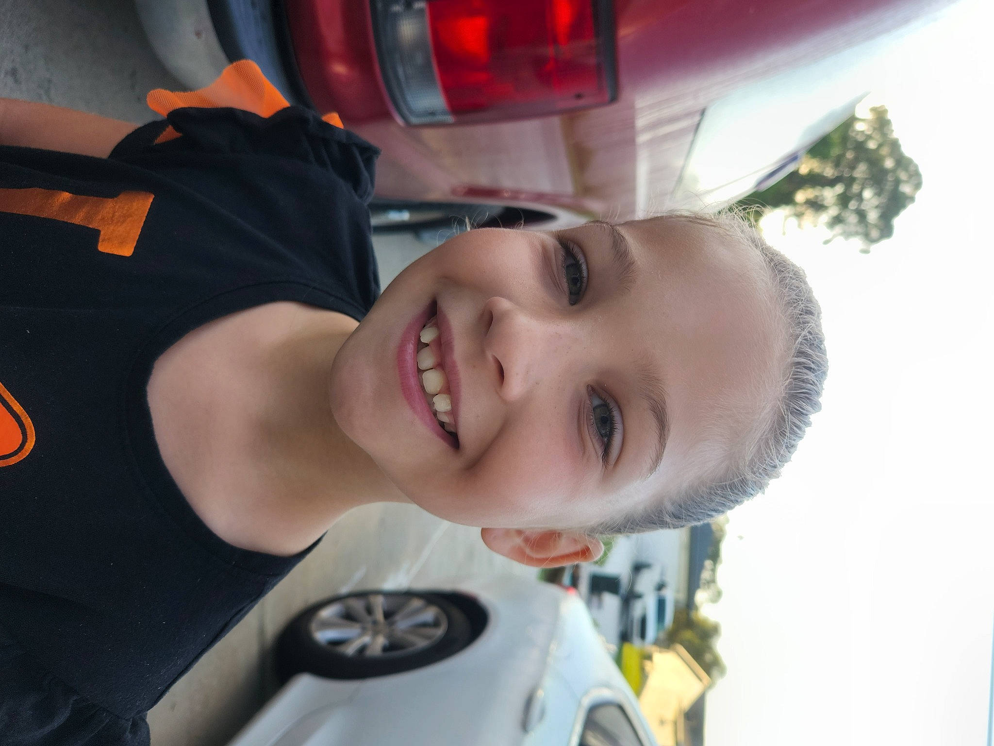 Morgan joined the competition — help win amazing prizes! automotive_design, automotive_exterior, automotive_lighting, chest, eyebrow, eyewear, forehead, fun, happy, headgear, jaw, joy, light, lip, motor_vehicle, mouth, nose, person, selfie, smile