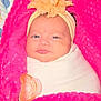 Camila is registered to the contest to win money with this photo: baby, infant, blanket, headband, flower, pacifier, wrapped, cute, face, person, child, soft, pink, orange, bed, sleepwear, newborn, portrait, comfort, cozy