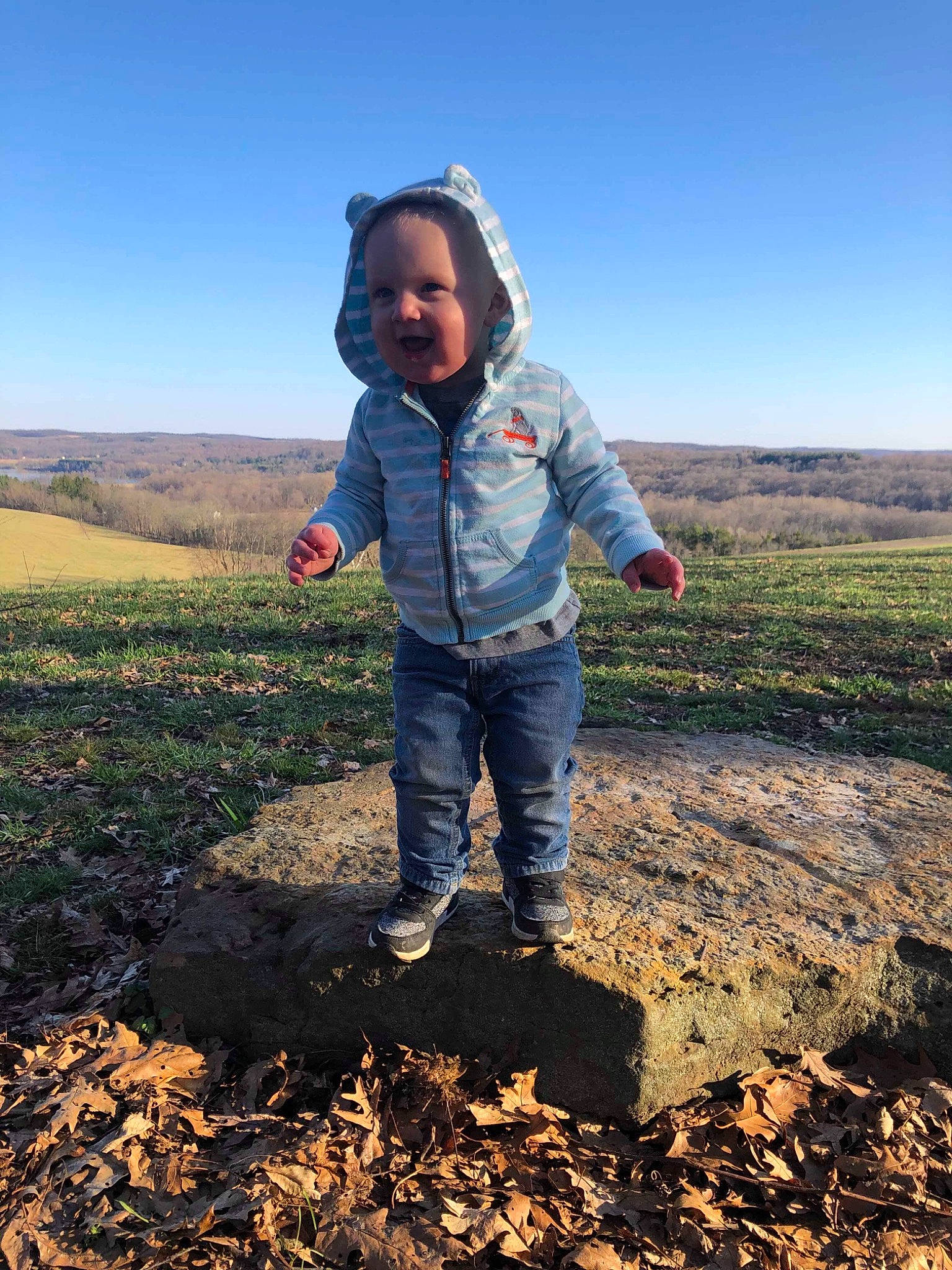 Braxton joined the competition — help win amazing prizes! child, fun, grass, grassland, hill, jeans, landscape, leaf, mountain, person, rock, sky, soil, toddler, tree, vacation, wilderness