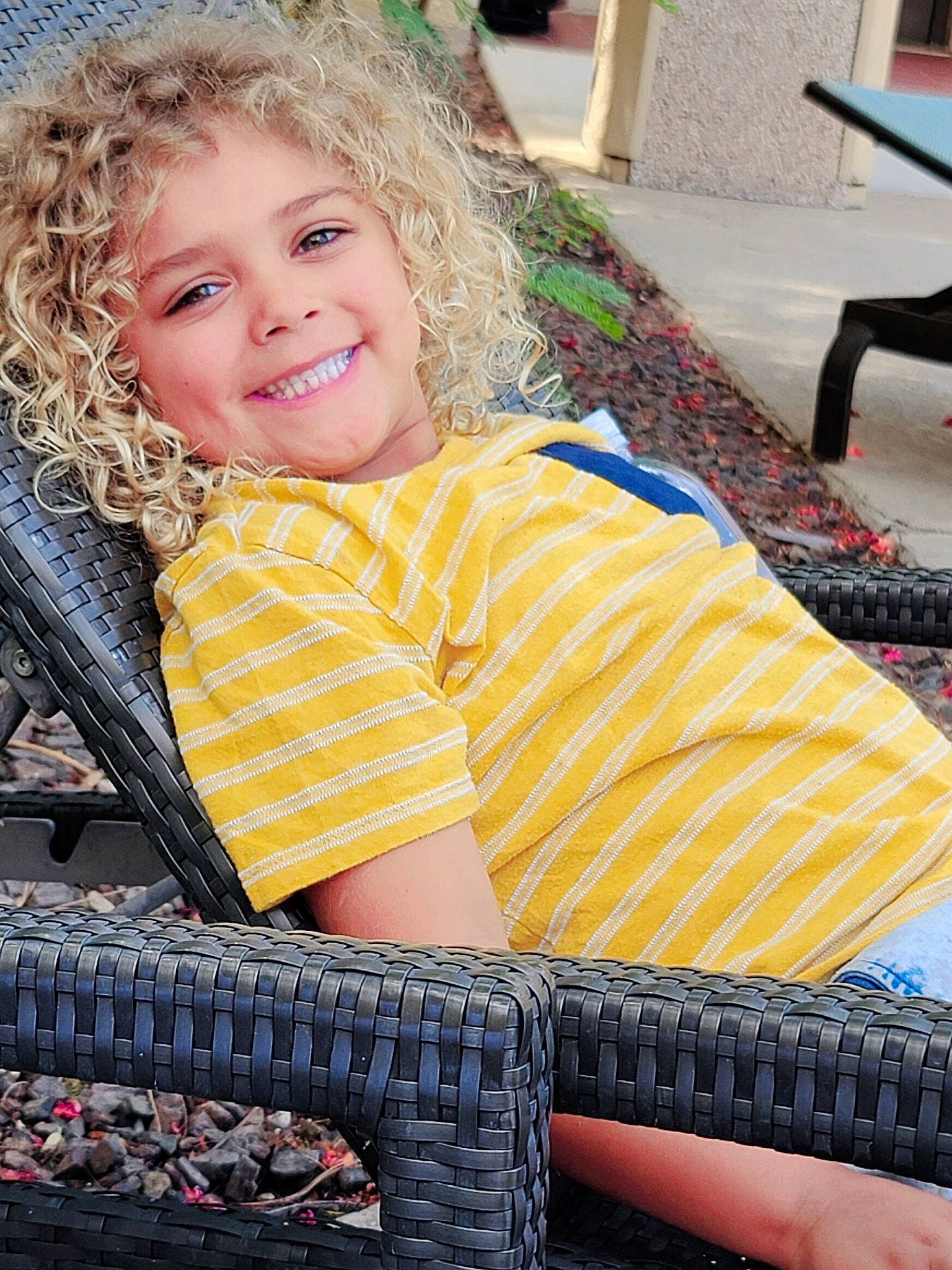 Kaislynn joined the competition — help win amazing prizes! bag, blond, chair, child, electric_blue, facial_expression, fun, grass, happy, joy, leisure, linens, pattern, people_in_nature, person, recreation, sitting, smile, summer, t_shirt