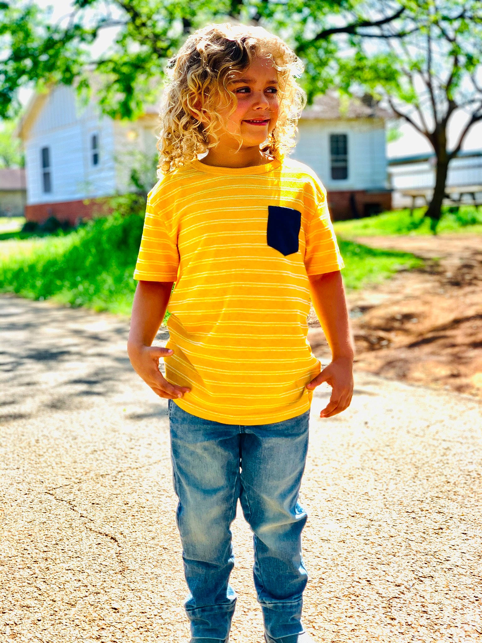 Kaislynn is registered to the contest to win money with this photo: child, grass, hair, happy, head, human, joy, leaf, leisure, nature, outerwear, people_in_nature, person, plant, recreation, sleeve, street_fashion, summer, sunlight, t_shirt