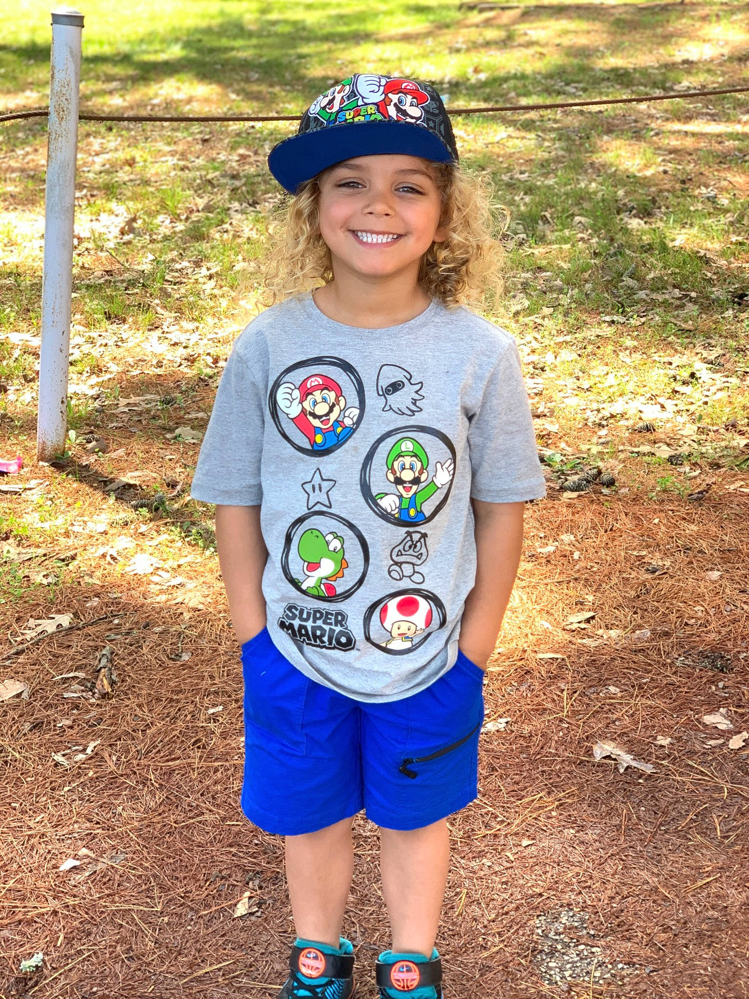 Kaislynn is registered to the contest to win money with this photo: baby_toddler_clothing, baseball_cap, child, clothing, cool, electric_blue, fun, grass, hairstyle, happy, hat, headwear, joy, leisure, outerwear, people_in_nature, person, recreation, shorts, sleeve