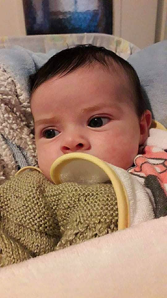 Elicia participe au concours pour gagner de l'argent avec cette photo : baby, baby_safety, baby_sleeping, baby_toddler_clothing, cheek, chin, comfort, ear, eyebrow, eyelash, headgear, iris, linens, lip, mouth, nose, outerwear, person, skin, toddler