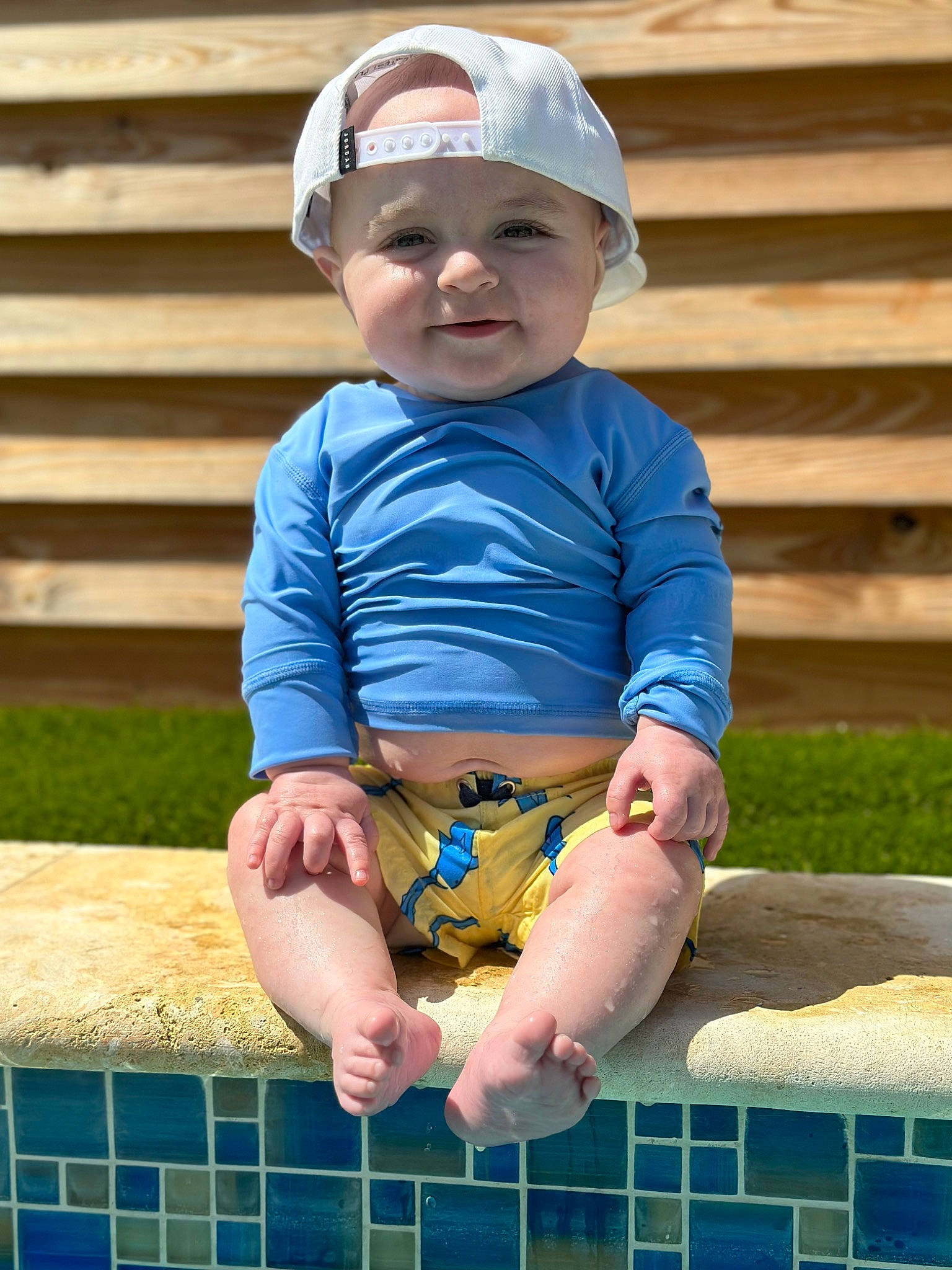 Crew joined the competition — help win amazing prizes! baby_toddler_clothing, blue, cap, child, clothing, face, grass, happy, headgear, headwear, joy, leg, leisure, person, photograph, pink, shorts, skin, sleeve, smile