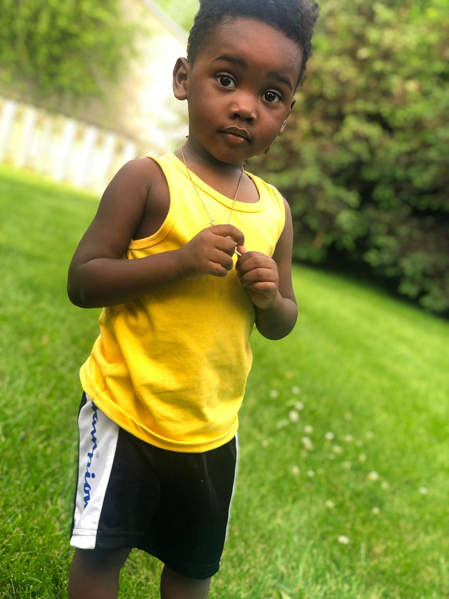 Hakeem is registered to the contest to win money with this photo: child, exercise, grass, happy, male, person, play, recreation, running, shorts, smile, t_shirt, toddler, yellow