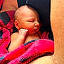Waylen is registered to the contest to win money with this photo: arm, baby, black, blanket, closeup, comfort, cozy, face, hand, human, infant, newborn, person, portrait, red, rest, skin, sleeping, tenderness, warmth