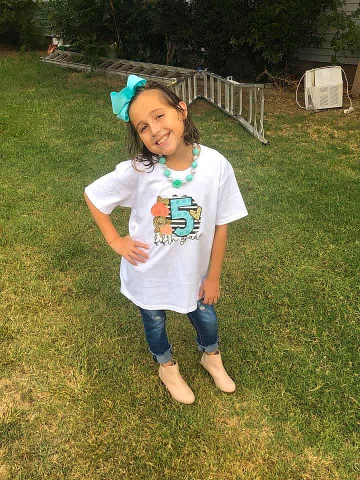 Julie is registered to the contest to win money with this photo: baby_toddler_clothing, child, denim, fun, grass, grass_family, grassland, happy, jeans, joy, lawn, leisure, people_in_nature, person, recreation, sleeve, soil, spring, summer, t_shirt