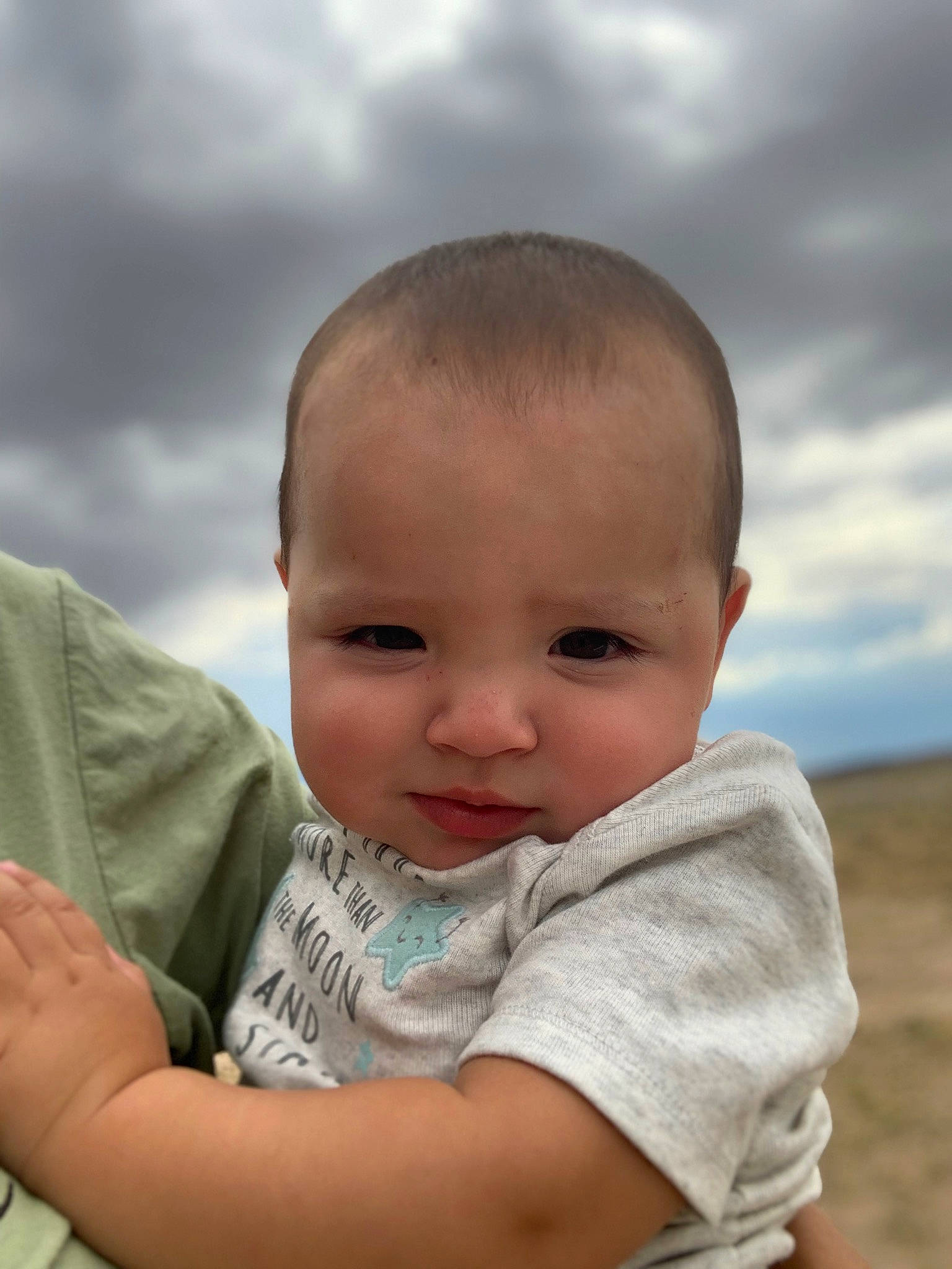 Gael joined the competition — help win amazing prizes! baby, baby_toddler_clothing, child, cloud, flash_photography, fun, gesture, grass, grassland, happy, leisure, meteorological_phenomenon, people_in_nature, person, sitting, skin, sky, sleeve, t_shirt, toddler