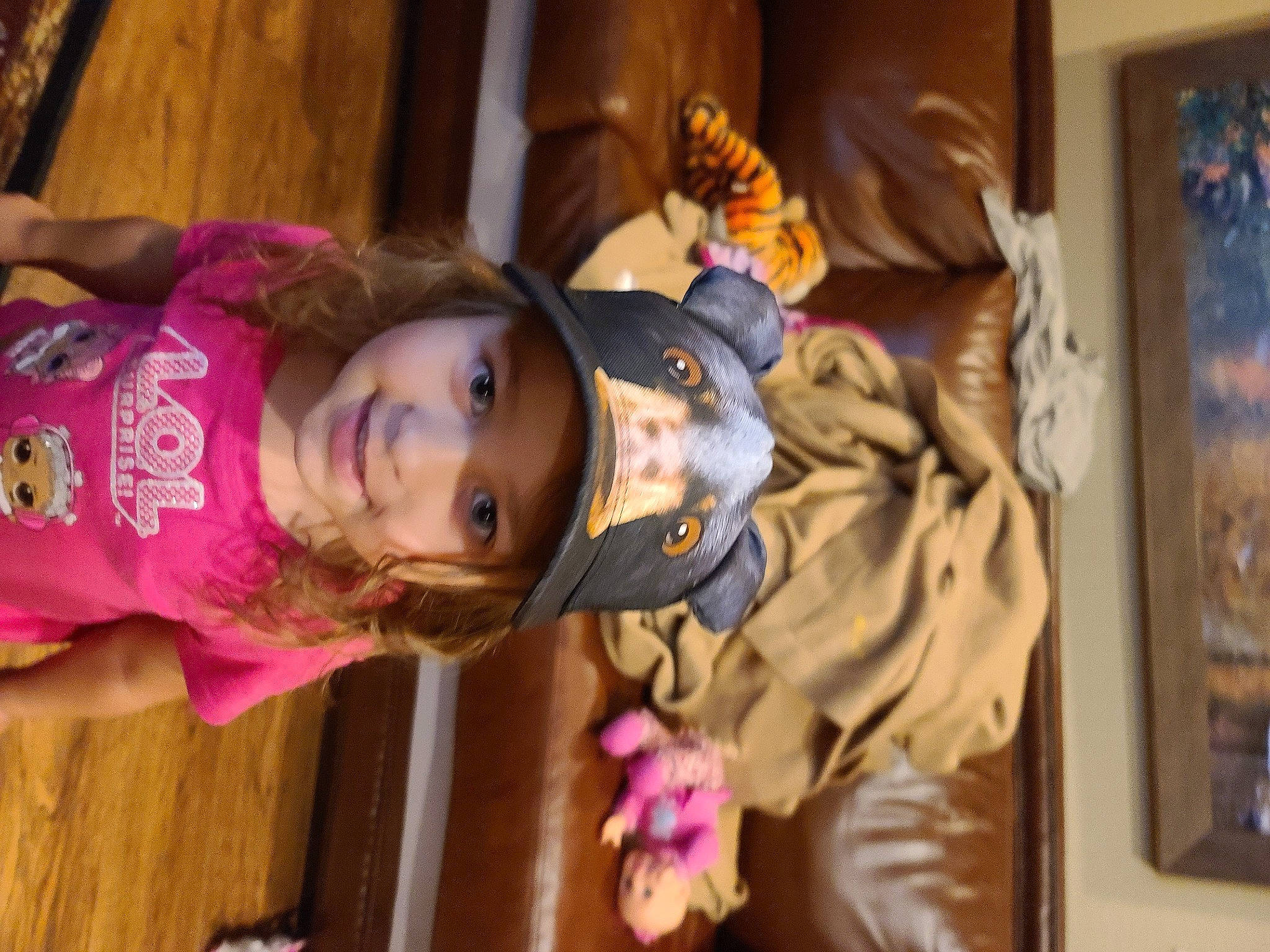 Mercedes is registered to the contest to win money with this photo: baby_toddler_clothing, black_hair, child, cool, headwear, joy, person, picture_frame, pink, pollinator