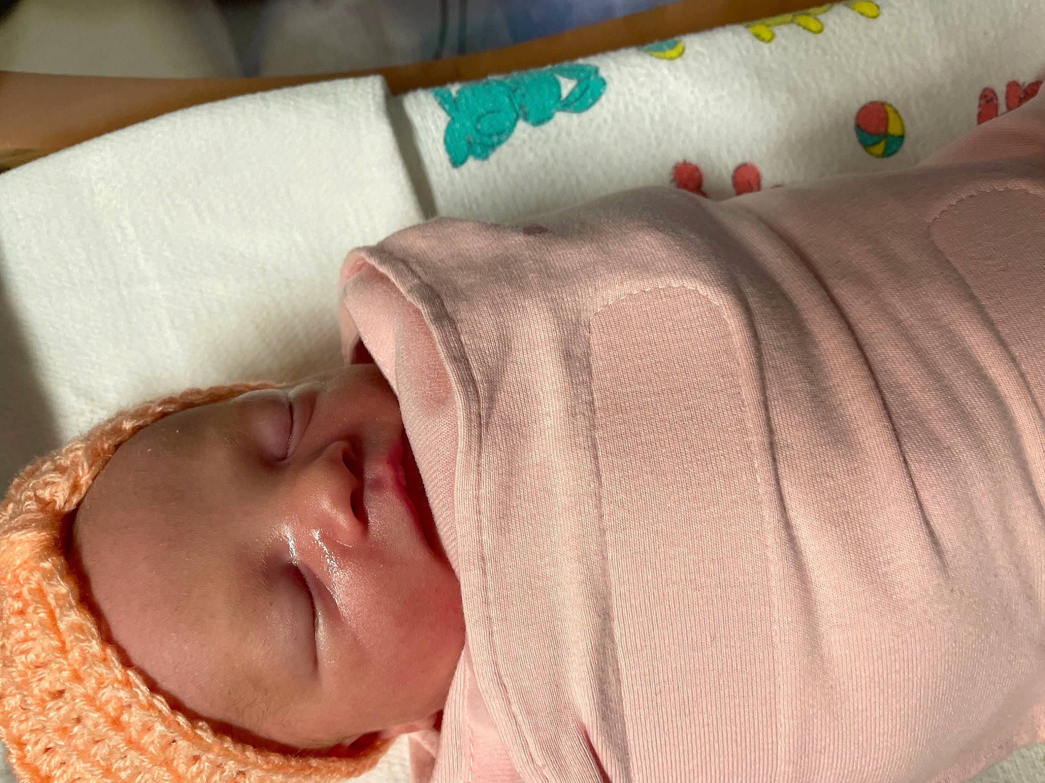 Jessica is registered to the contest to win money with this photo: baby, baby_products, baby_sleeping, baby_toddler_clothing, cheek, child, comfort, eyelash, finger, head, headgear, linens, mammal, nose, person, pink, product, skin, smile, textile