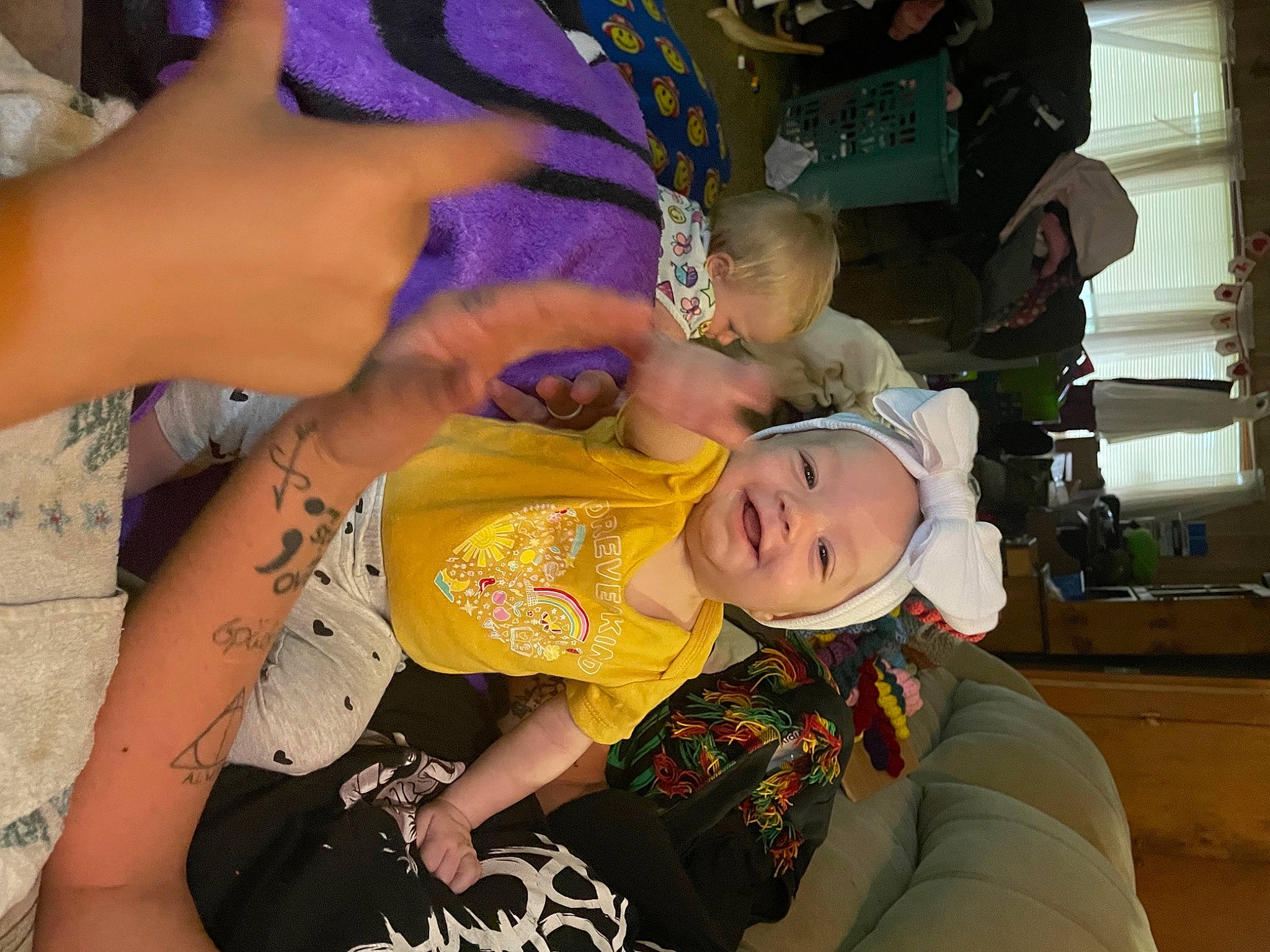 Jessica is registered to the contest to win money with this photo: baby, baby_toddler_clothing, bracelet, child, event, fashion_accessory, fun, gesture, happy, hat, jewellery, nail, pattern, person, skin, smile, toddler, tradition, tree, vacation