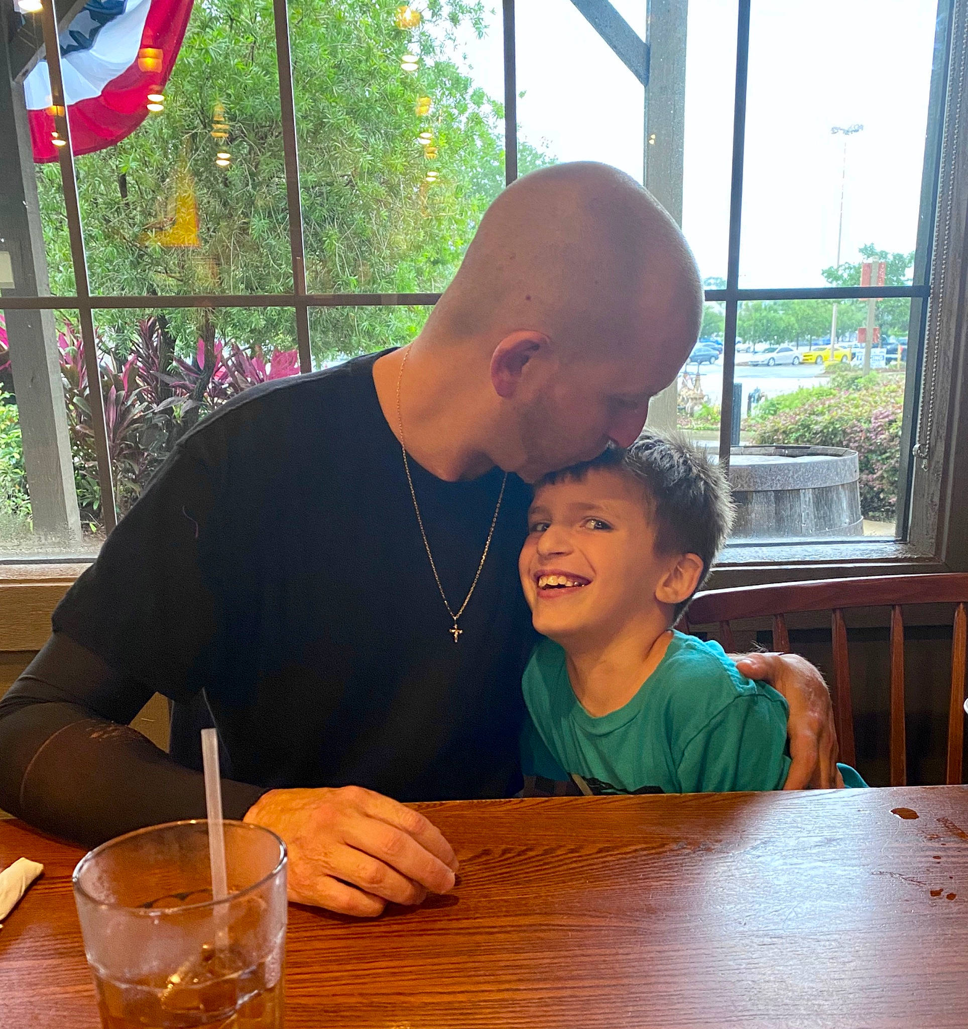 Hunter joined the competition — help win amazing prizes! chair, drink, drinkware, event, fun, glass, happy, joy, leisure, morning, person, plant, sharing, sitting, smile, t_shirt, table, tableware, tree, vacation