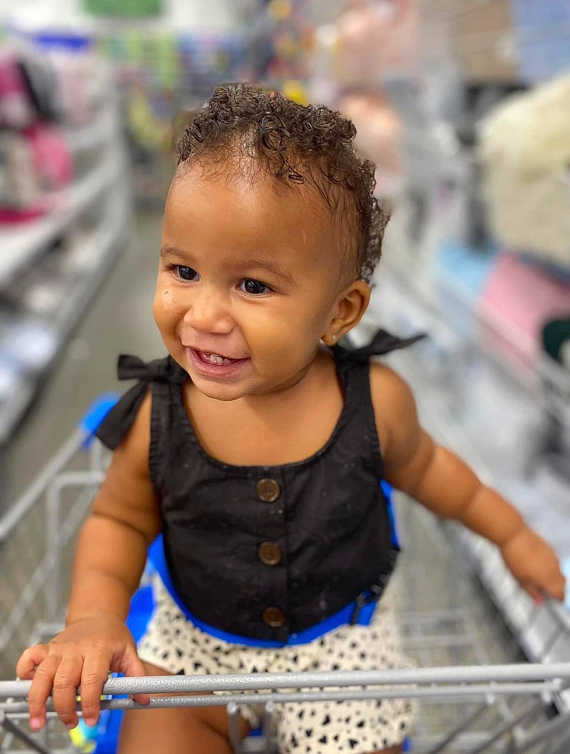 Kaliyah is registered to the contest to win money with this photo: baby_toddler_clothing, beauty, bicycle_tire, child, facial_expression, fun, hairstyle, happy, human, iris, leisure, organ, people, person, photograph, skin, smile, summer, tire, toddler