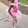 Elena is registered to the contest to win money with this photo: child, ballet, tutu, pink, ballerina, dance, outdoor, pose, girl, smile, braids, hair_beads, ballet_slippers, tights, side_view, concrete_path, greenery, joyful, fashion, performance