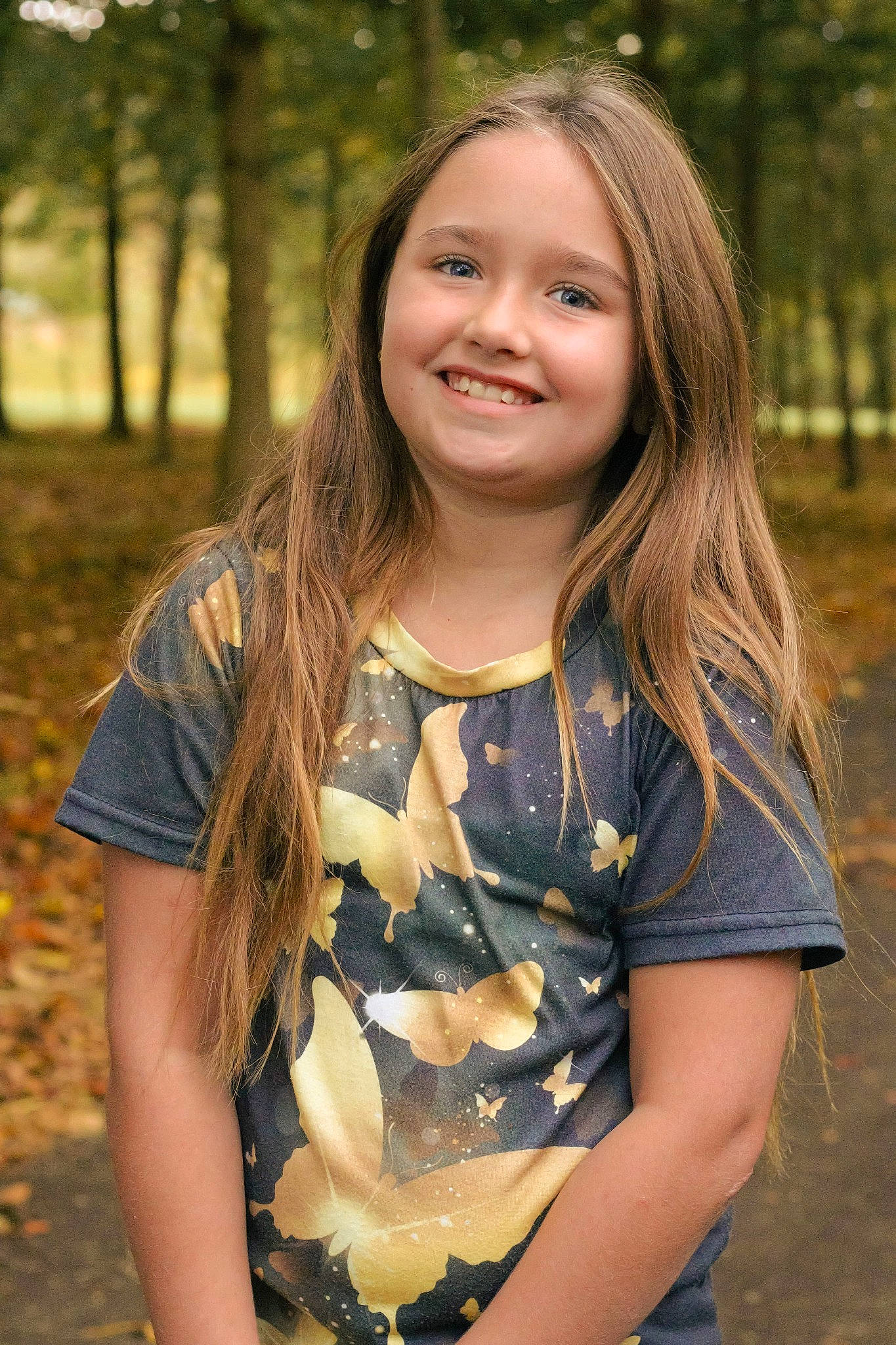 Laila is registered to the contest to win money with this photo: clothing, eye, facial_expression, fawn, flash_photography, grass, hair, happy, iris, joy, leaf, lip, nature, people_in_nature, person, plant, skin, smile, standing, sunlight