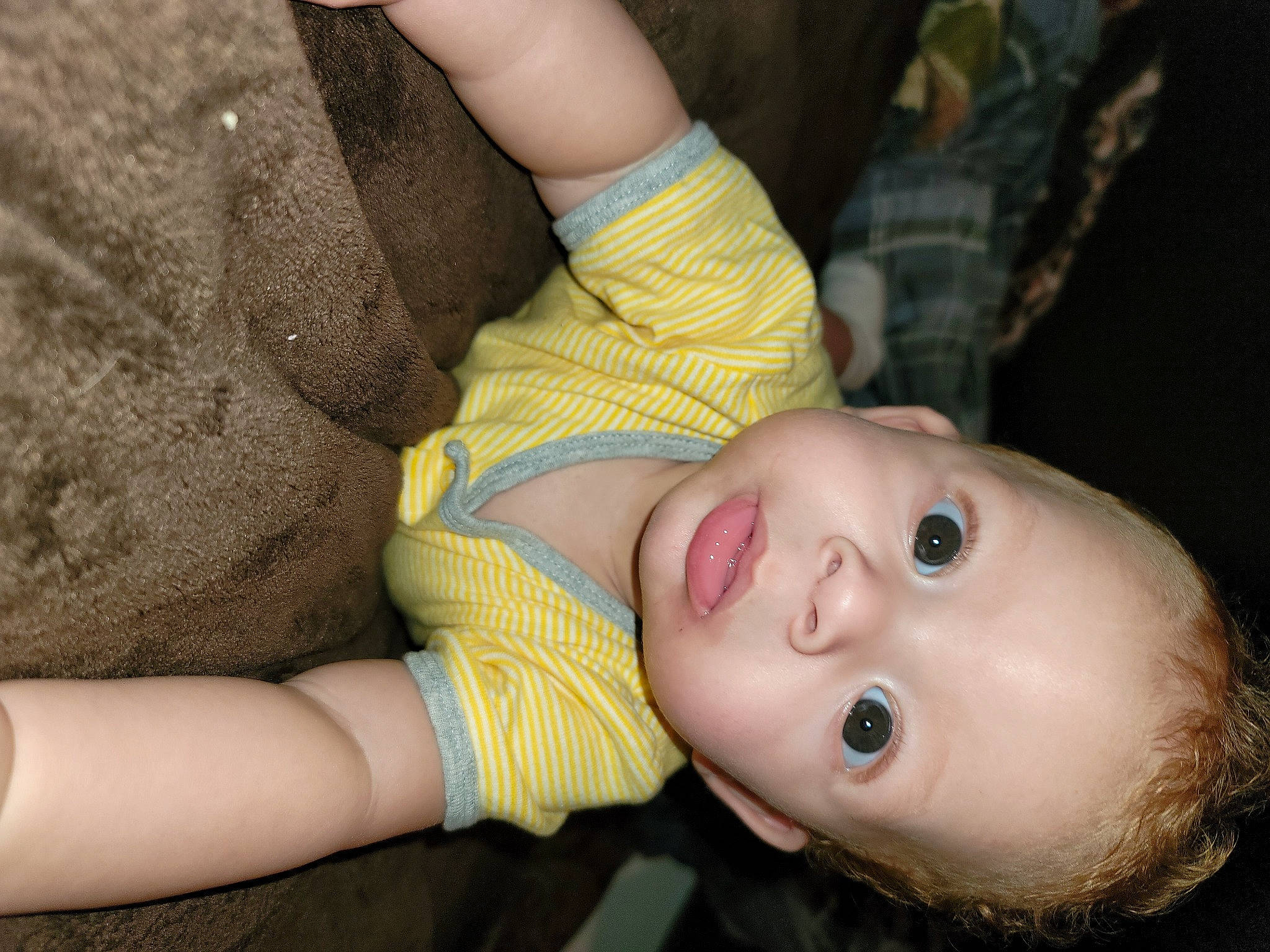 Andre is registered to the contest to win money with this photo: baby, baby_toddler_clothing, cheek, child, comfort, eyelash, face, finger, flash_photography, gesture, grass, happy, human_leg, iris, lip, mouth, neck, nose, person, skin