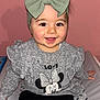 Léa a rejoint le concours — aidez-le/la à gagner de superbes lots ! baby, black_pants, bow, child, clothing, cushion, cute, gray_sweater, happy, headband, indoors, long_sleeves, minnie_mouse, patterned_cushion, person, pink_background, portrait, sitting, smiling, young_child