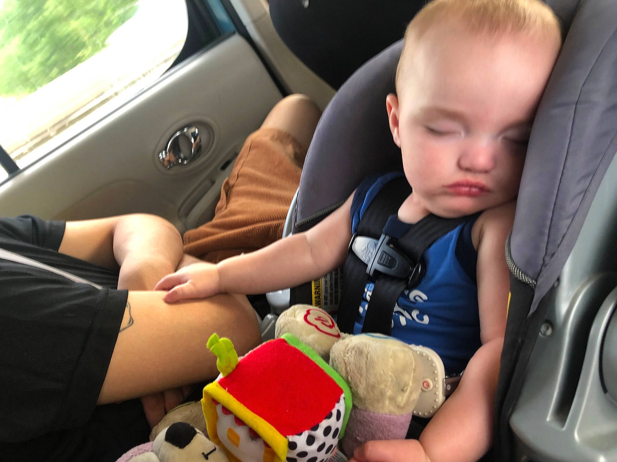 Lochlan is registered to the contest to win money with this photo: auto_part, automotive_design, baby, car, car_seat, car_seat_cover, comfort, finger, hand, head_restraint, motor_vehicle, person, plant, seat_belt, steering_part, thumb, toddler, toy, vehicle, vehicle_door