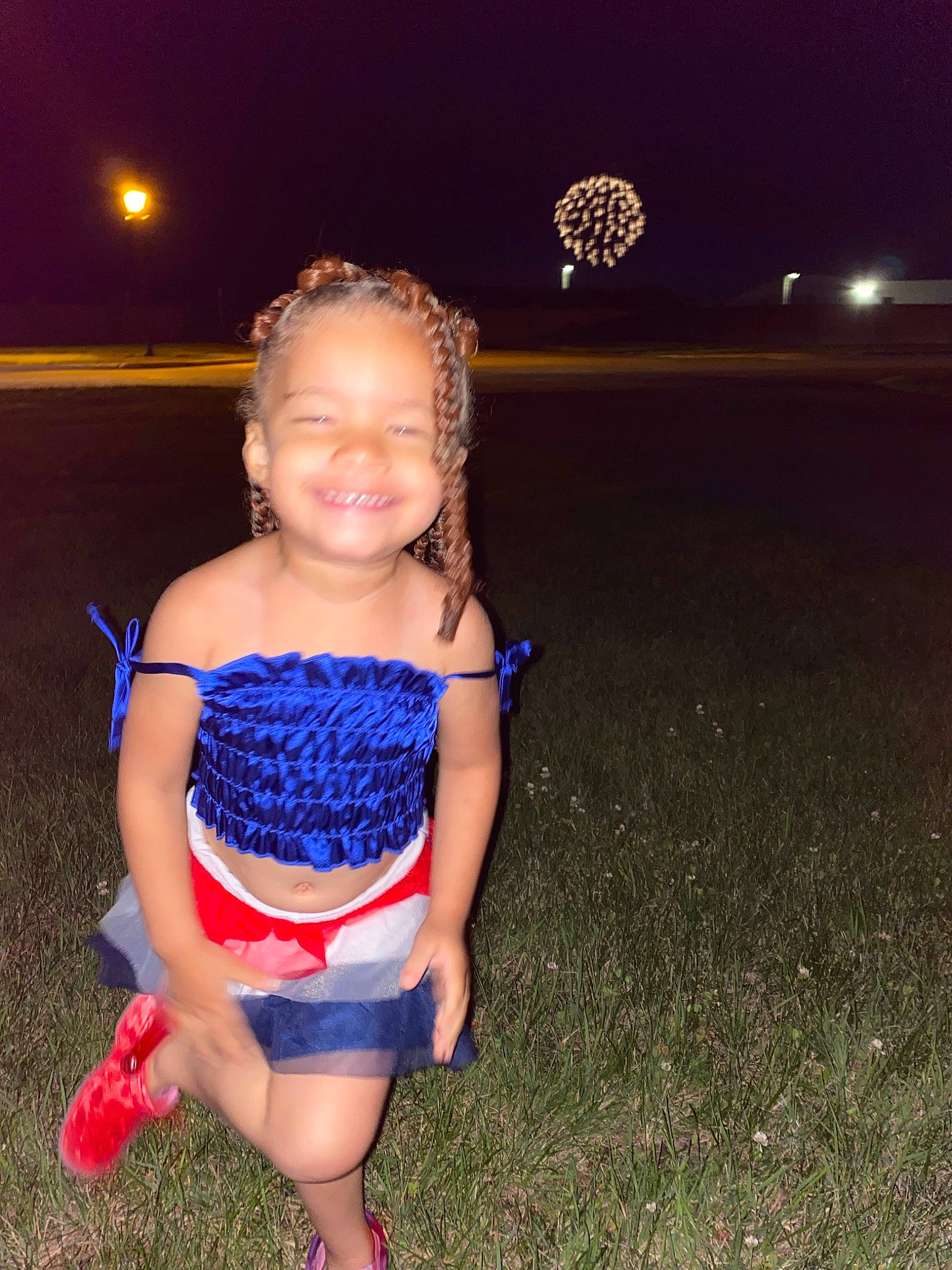 Jana is registered to the contest to win money with this photo: electric_blue, event, eye, face, flash_photography, fun, grass, happy, head, human_leg, joy, leg, leisure, person, sandal, sky, smile, standing, street_light, thigh