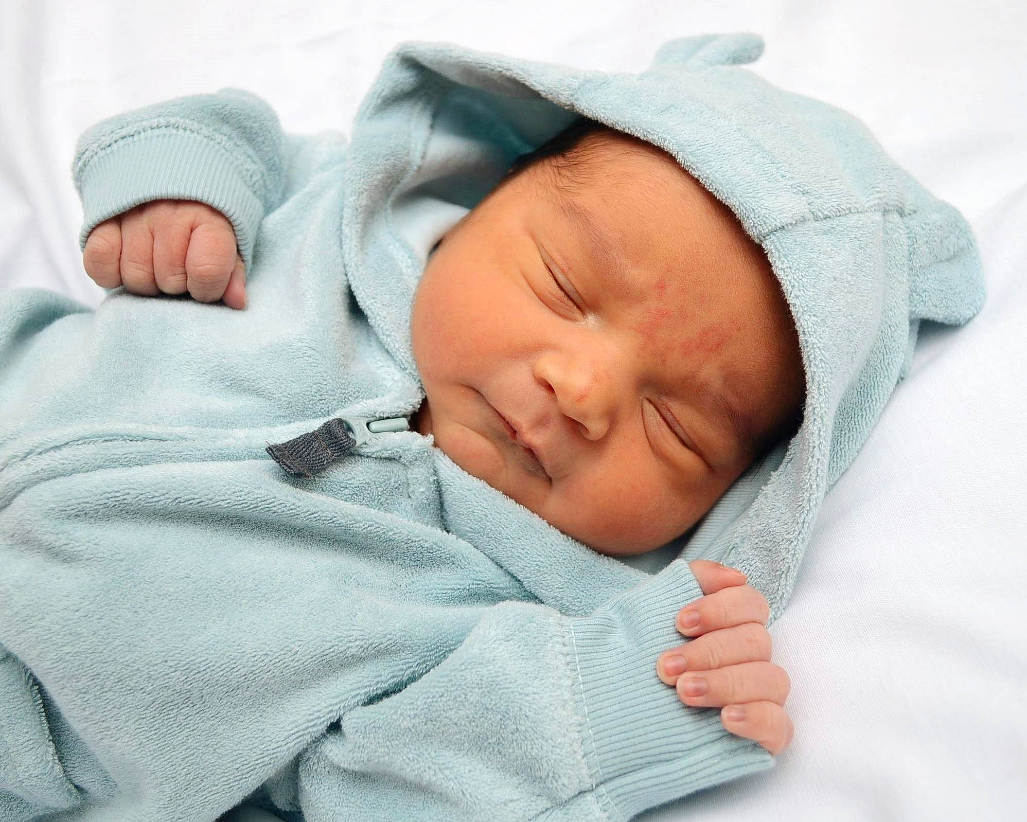 Allen is registered to the contest to win money with this photo: baby, baby_products, baby_sleeping, baby_toddler_clothing, bedtime, cheek, child, childbirth, comfort, hat, headwear, linens, nap, nose, person, portrait_photography, skin, sleep, sleeve, textile