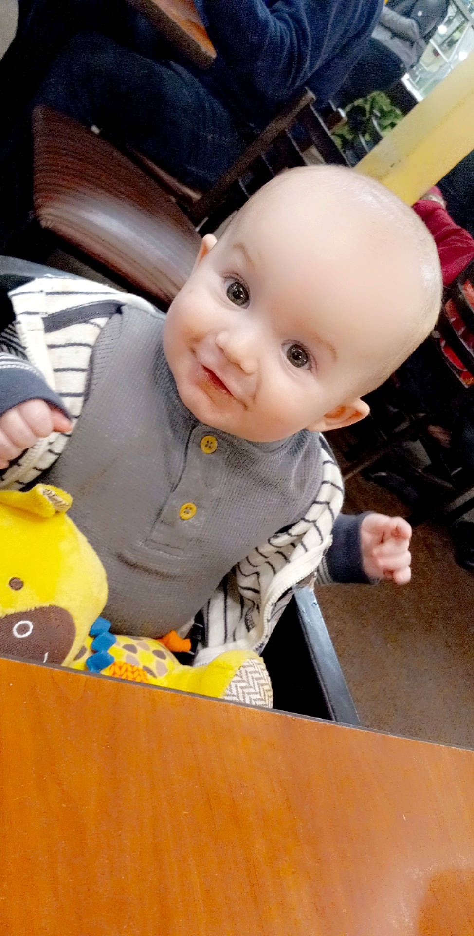 Duncan is registered to the contest to win money with this photo: baby, baby_carriage, baby_products, baby_toddler_clothing, car_seat, cheek, child, facial_expression, finger, flooring, fun, happy, joy, leisure, person, play, sitting, skin, smile, toddler